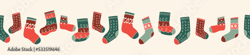 Colorful Retro Knitted Socks Vector Seamless Pattern Horizontal Border. Hand Drawn Fair Isle Knitwear Graphic Print. Winter Holiday Background. Red and White Christmas Doodle Design