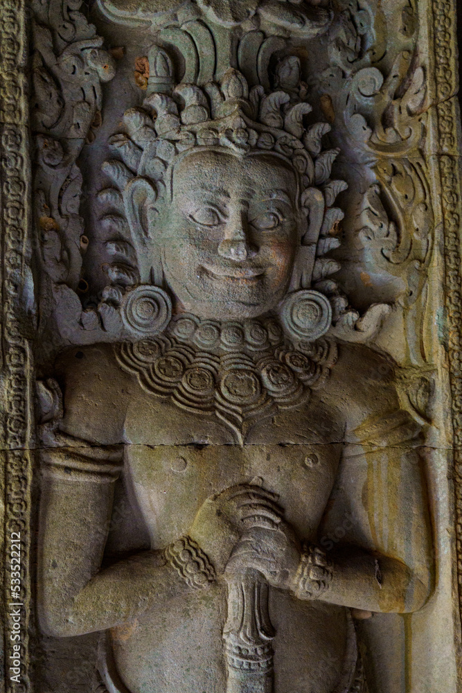 Cambodia. Siem Reap. The archaeological park of Angkor. A bas relief sculpture of Deva at Preah Khan 12th century Hindu temple