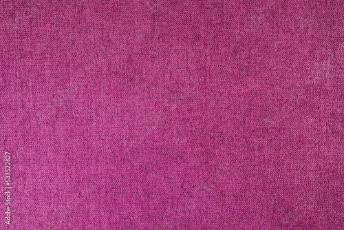 Texture background of velours purple fabric. Fabric texture of upholstery furniture textile material, design interior, wall decor. Fabric texture close up, backdrop, wallpaper. © katyamaximenko
