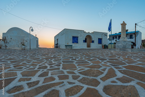 Il tramonto visto dalla piazzetta principale del villaggio di Chora, isola di Anafi GR	 photo