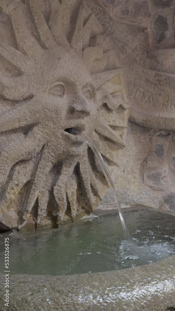 italian style stone fountain with a spitting sun with face in val'quirico, Tlaxcala, Mexico italian style stone fountain with a spitting sun with face in val'quirico, Tlaxcala, Mexico