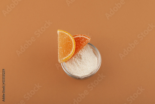Pectin gum powder in glass bowl, top view. Food additive E440. Citrus Pectin used to make high quality, tender, confectionery jellies and marmalades