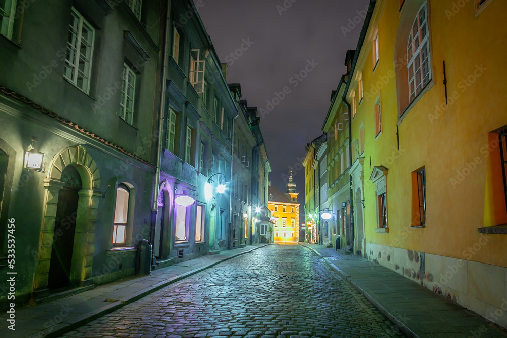 Warsaw's Old Town illuminated street at night, Poland, Eastern europe