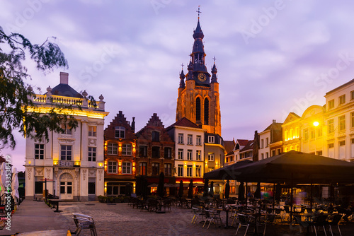 Εκτύπωση καμβά Picturesque view of city of Kortrijk with illuminated main square and St Martins