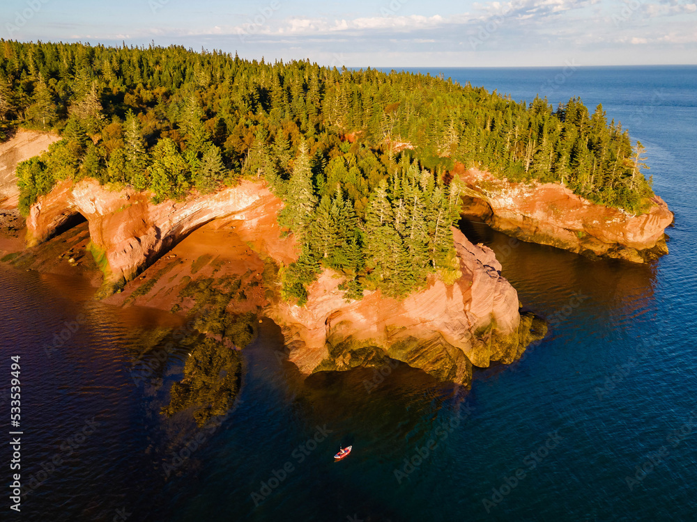 Aerial sunset view of St Martins Sea Caves