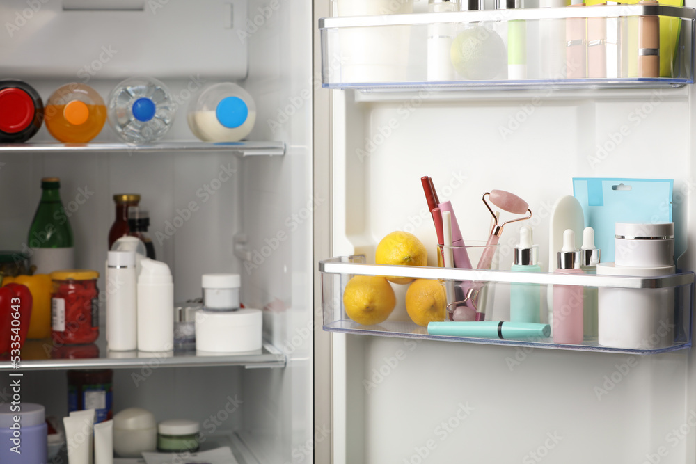 Different cosmetic products on shelves in refrigerator Different cosmetic products on shelves in refrigerator