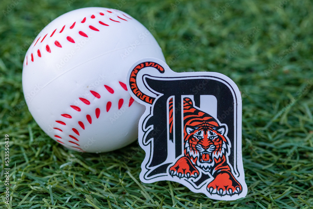 September 26, 2022, Cooperstown, New York. The emblem of the Detroit Tigers  baseball club and a baseball. Stock Photo | Adobe Stock