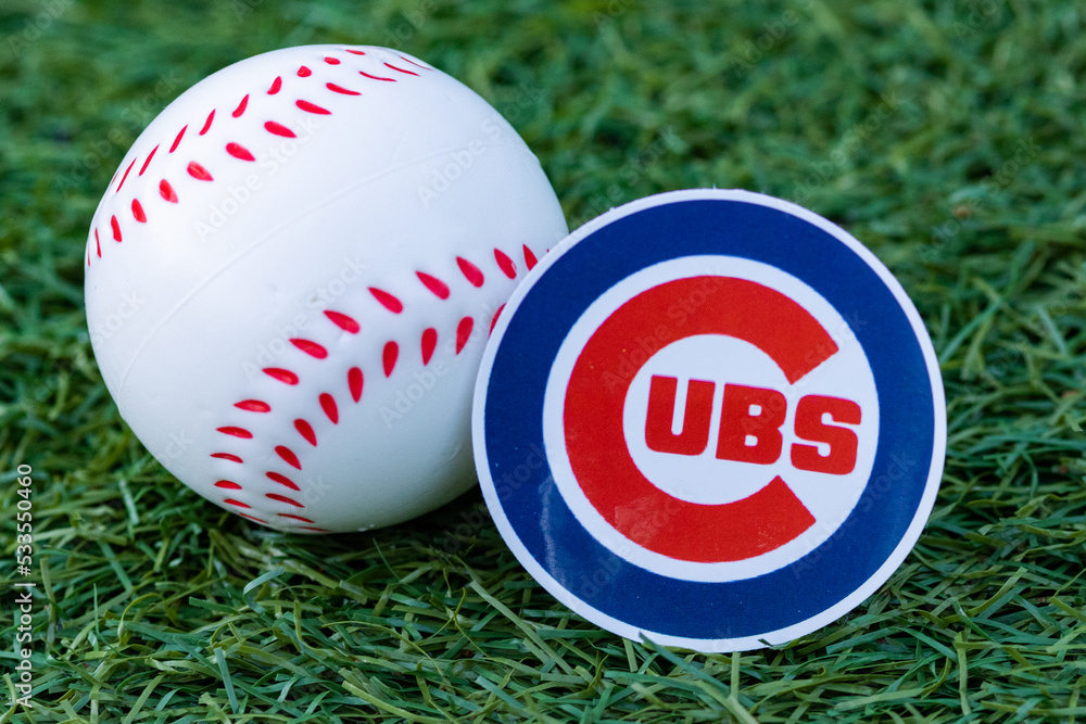 September 26, 2022, Cooperstown, New York. The emblem of the Chicago Cubs  baseball club and a baseball. Stock Photo | Adobe Stock