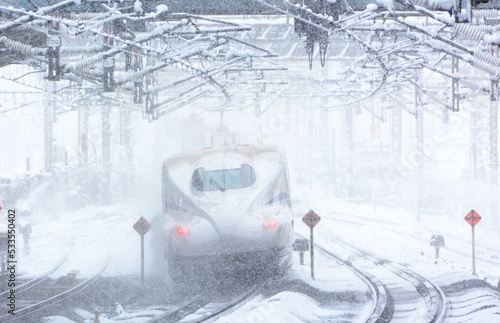 Tokaido Shinkansen N700S passing through Maibara station at snowy day