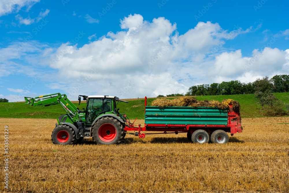 Combine harvester working on a field Combine harvester working on a field