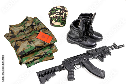 Kalashnikov assault rifle, military uniform and documents of a citizen of the Russian Federation on a white background. Text in Russian "MILITARY ID"
