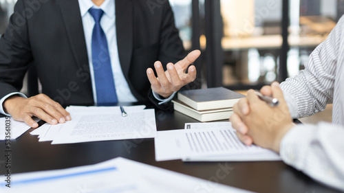 Attorney or judge provides legal advice to the client in the courtroom, Ethics in the courts include justice and impartiality, Legal consultant, Scales of justice, Law hammer, Litigation and justice.