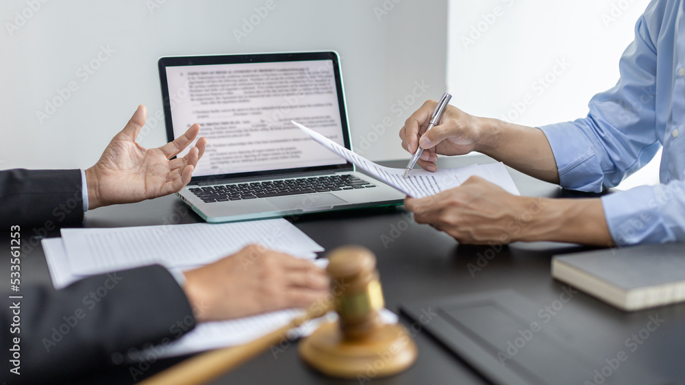 © Puwasit Inyavileart - Lawyer or judge has recommend a client sign a legal agreement in the courtroom, Legal Agreement Documents and Business Litigation Forms, scales of justice, law hammer, Litigation and legal services. © Puwasit Inyavileart - Lawyer or judge has recommend a client sign a legal agreement in the courtroom, Legal Agreement Documents and Business Litigation Forms, scales of justice, law hammer, Litigation and legal services.