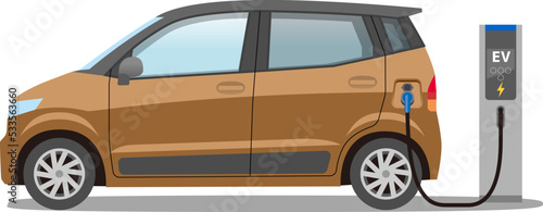 Copper small electric car at charging station BEV