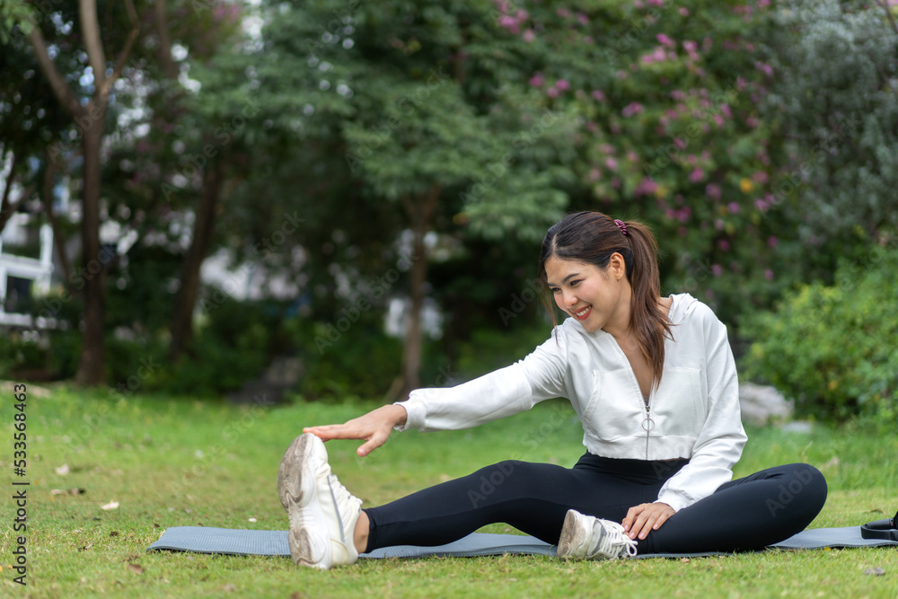Portrait sport asian beauty body slim woman warming up in sportswear relax and do fitness exercise with stretching workout before fitness training in park.Diet concept.Fitness and healthy Portrait sport asian beauty body slim woman warming up in sportswear relax and do fitness exercise with stretching workout before fitness training in park.Diet concept.Fitness and healthy