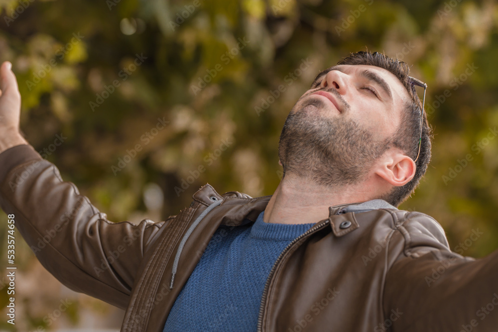 man breathing peace and tranquility in autumn background man breathing peace and tranquility in autumn background