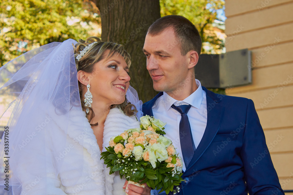 young married couple on their wedding day,wedding couple look at each otheron their wedding day young married couple on their wedding day,wedding couple look at each otheron their wedding day