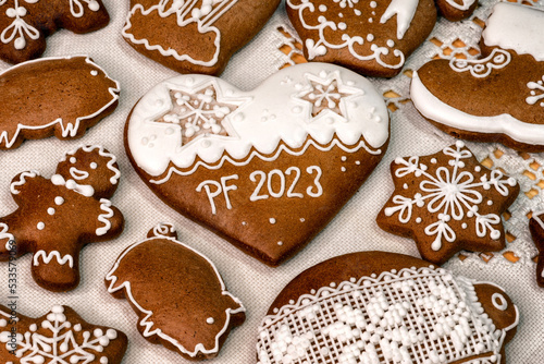 PF 2023 on Christmas gingerbread cookie. Happy new year
