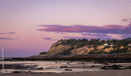 Early morning walk at low tide along Cliff End and Pett Level Beach Hastings East Sussex south east England