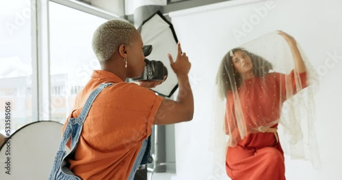 Black woman, photographer and fashion model in studio for creative art, clothes brand and designer social media blog. Digital photography, light equipment and people with photoshoot innovation ideas photo