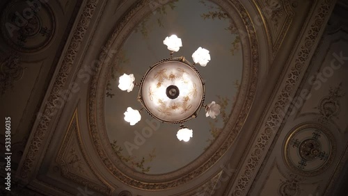 Slow Rotating Shot Looking Upwards At A Highly Detailed And Decorative Ceiling photo