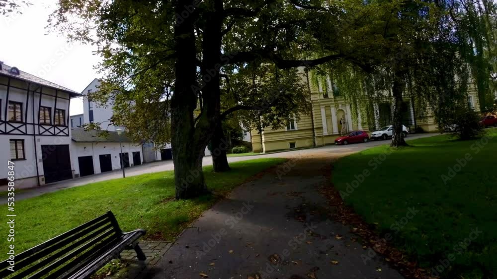 A running shot of a residential complex where few apartments are seen. A beautiful campus along with the garden