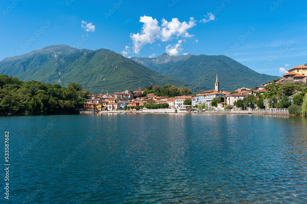 View over Lake Mergozzo to the village of Mergozzo. Province of Piedmont in Northern Italy.