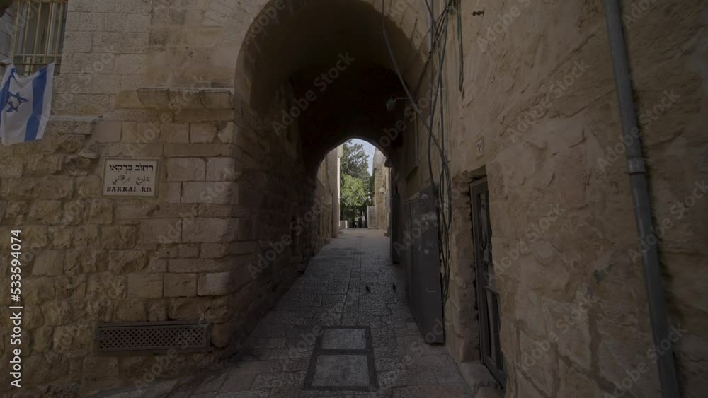 Walking in the narrow streets of the old city of Jerusalem. Walking in the narrow streets of the old city of Jerusalem.