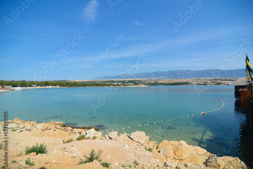 spiaggia di zrce famoso ritrovo per giovani isola di pag in croazia photo