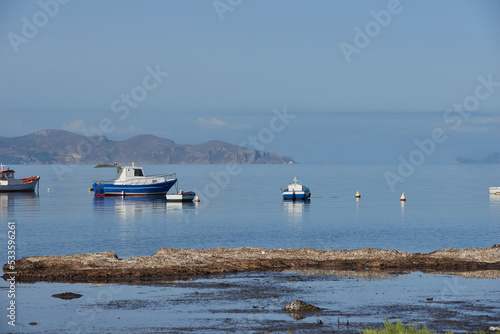 fishing boats and boats to the Egadi islands with calm sea and clear day