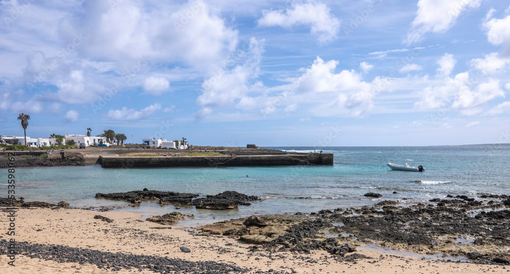 Dock landscape on La Graciosa island, turquoise waters, Lanzarote, Canary Islands, Spain.