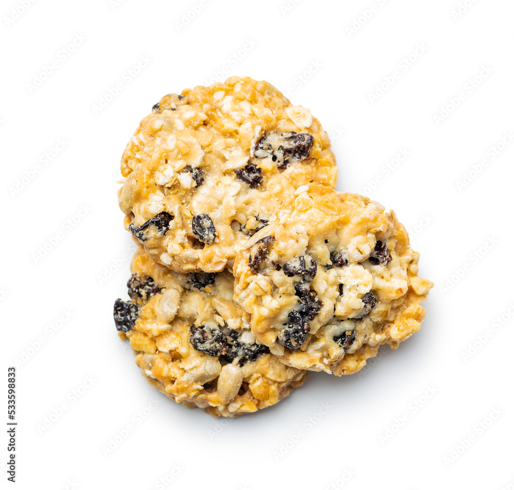 Wholegrain oat cookies. Cookies with oatmeal and raisins isolated on white table. Wholegrain oat cookies. Cookies with oatmeal and raisins isolated on white table.