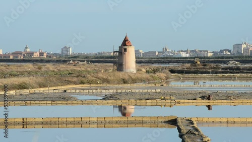 the salt pans of Trapani with the windmills in the morning