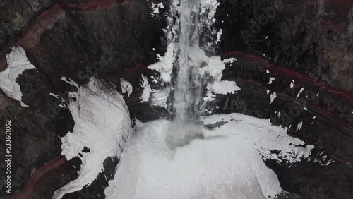 Drone Flight Of Hengifossa Waterfall And Snow photo