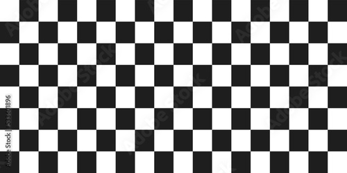 Seamless chess pattern. Black and white checkered cells. Suitable for packaging, printing, decor and stylish design.
