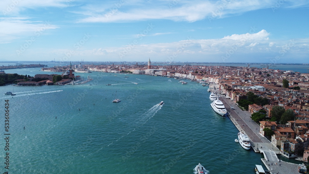 Scenic aerial footage of Venice, Italy. Fascinating aerial views of city, park, coastline and boats.