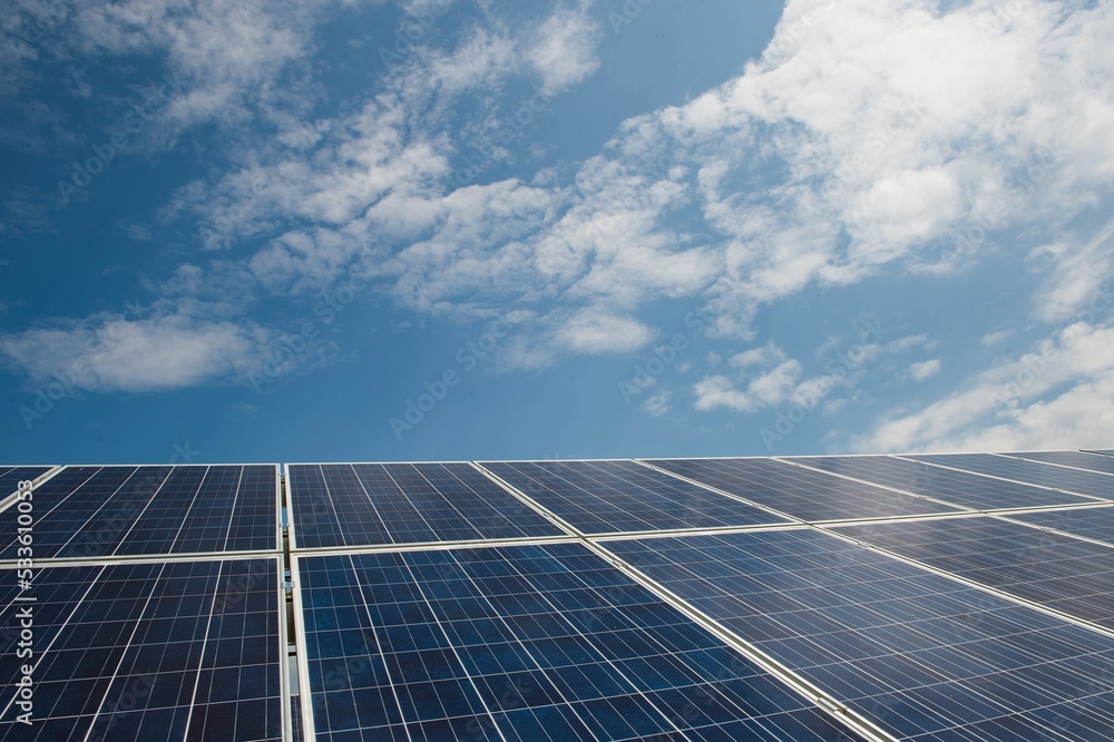 Solar panels field in a solar energy power plant used to produce electricity from the sunlight. Clean and renewable energy,power in nature. Solar panels field in a solar energy power plant used to produce electricity from the sunlight. Clean and renewable energy,power in nature.