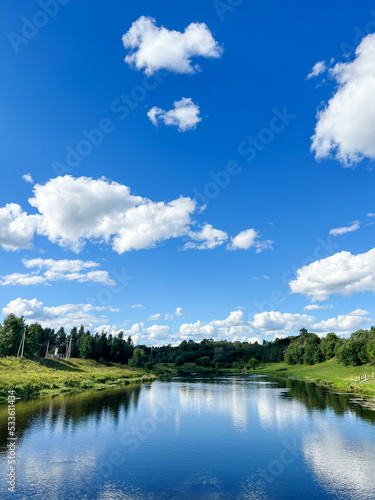 Beautiful natural scenery of river and blue sky in Moscow region, Russia. Summer landscape. © Philippova