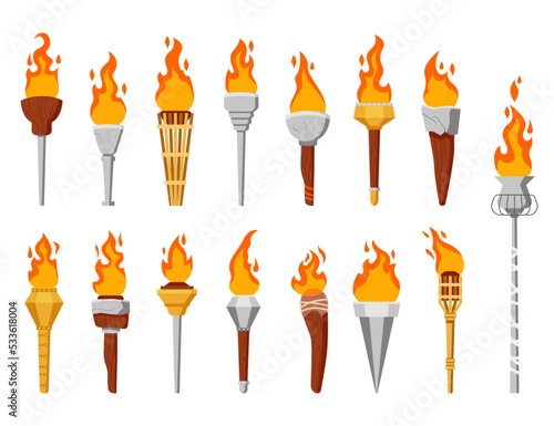 Medieval torches with burning fire set. Metal and wooden brands of different shapes with flame