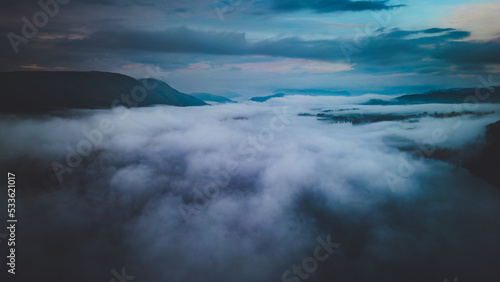 Cloud inversion over Ullswater in the Lake District from above with mountains