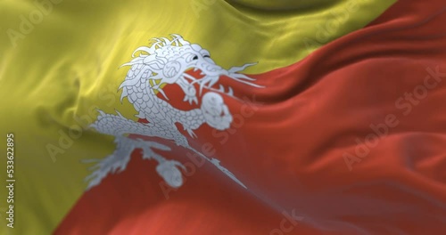 Close-up view of the Bhutan national flag waving in the wind photo