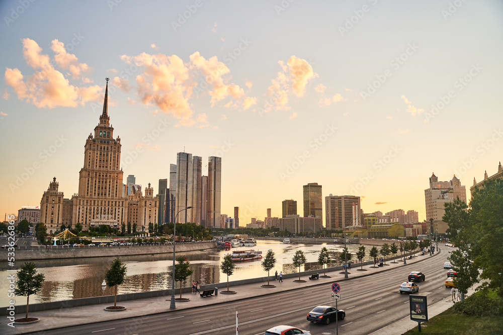 Moscow, Russia - 30.07.2022: Embankment of the Moscow River with a view of the hotel Ukraine and Moscow City