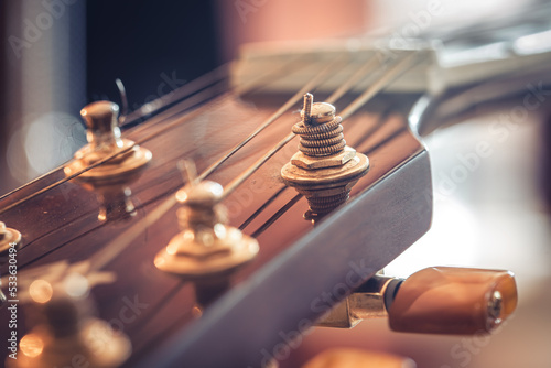 Canvas Print Strings on a classical acoustic guitar, macro shot.