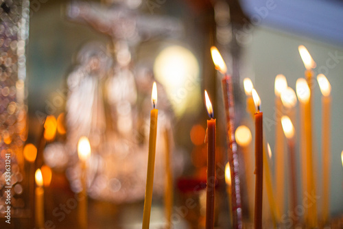 Fotografering church candles close-up, against the background of a specially blurred religious