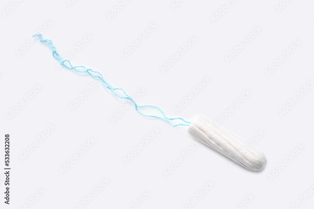 Medical female tampon on a pink background. Hygienic white tampon for women. Cotton swab. Menstruation, means of protection. Tampons on a red background. Medical female tampon on a pink background. Hygienic white tampon for women. Cotton swab. Menstruation, means of protection. Tampons on a red background.