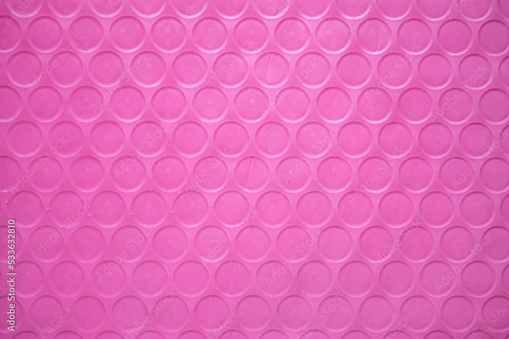 Pink plastic wrap air bubble texture background packaging material
