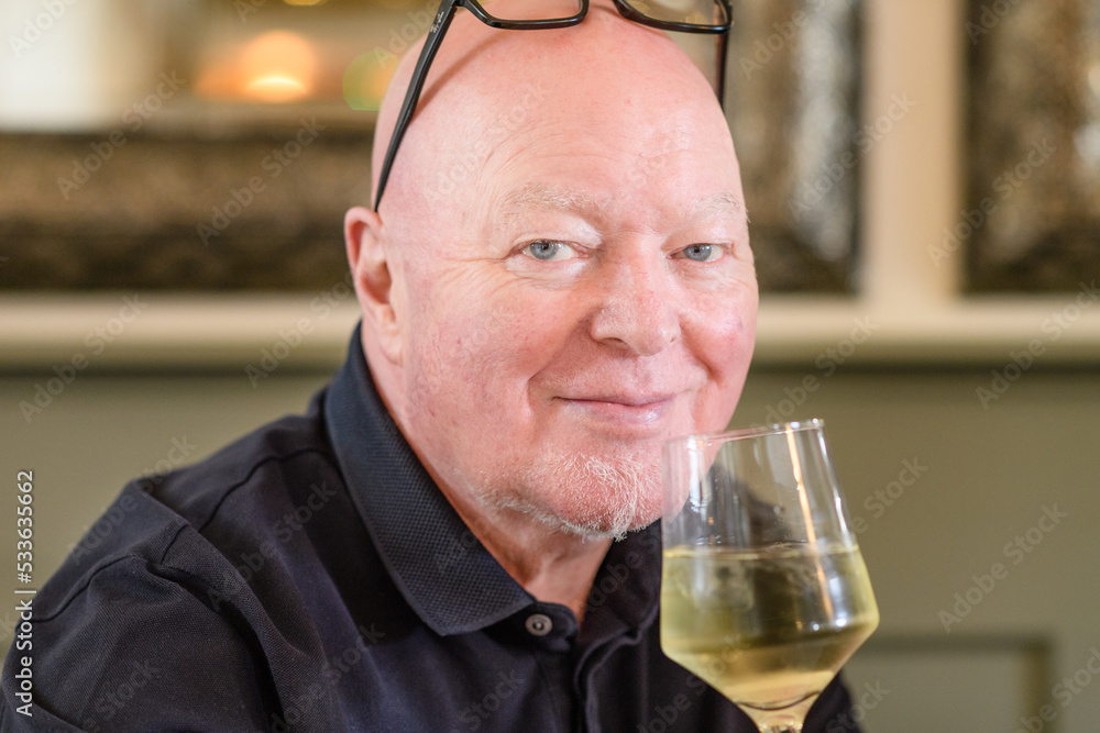 man with glass of wine man with glass of wine