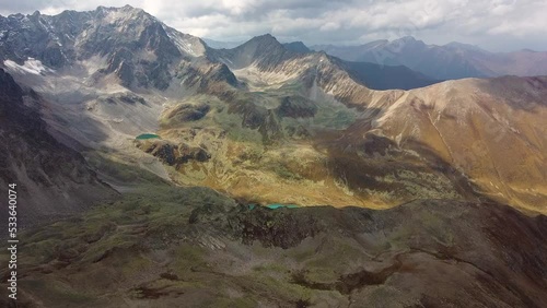 Caucasus mountains with lakes in summer from the height of the drone