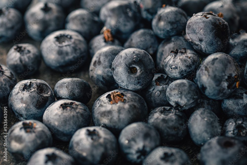 Wet ripe blueberries close up, macro shot. Wet ripe blueberries close up, macro shot.