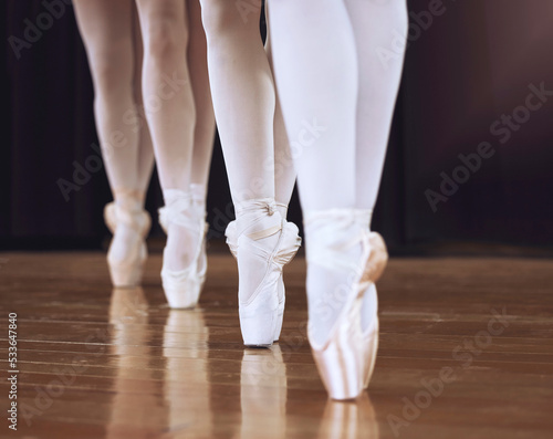 Ballet, fitness dancer and woman on theatre stage for dance workout, exercise and training creative art. Partnership, teamwork and zoom sport girl legs or ballerina women working together on concert.